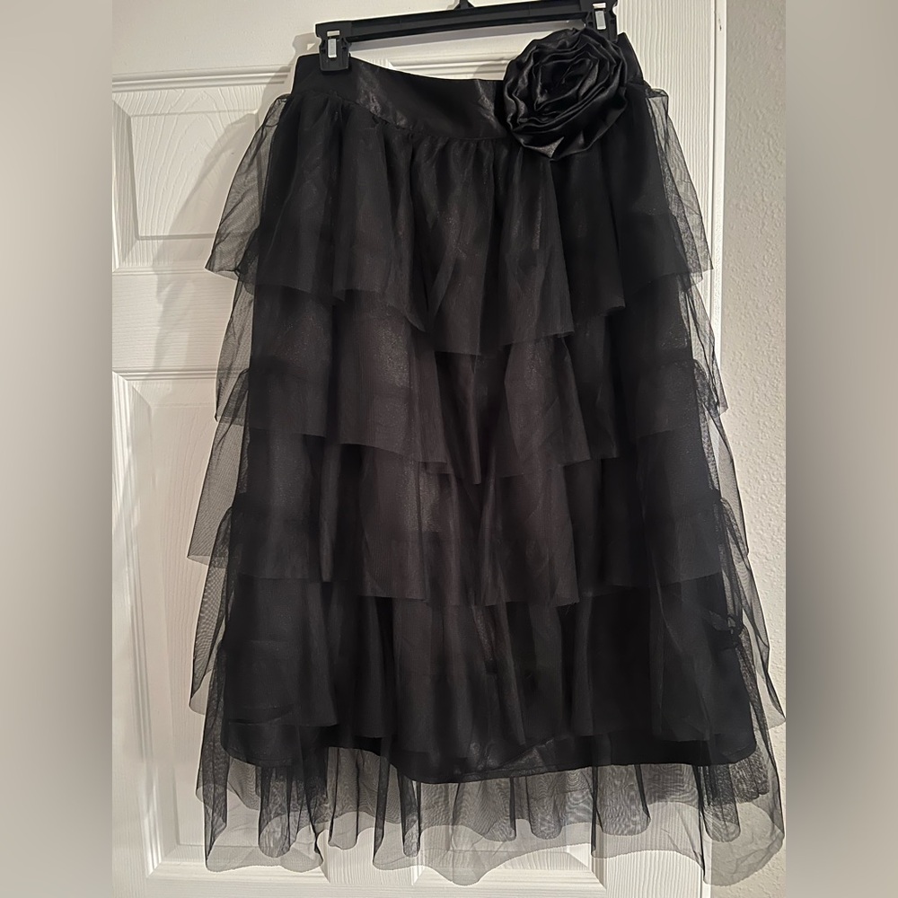Elegant Black Tiered A-Line Skirt with Floral Accent